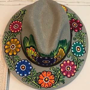 Like new. Hand painted hat